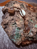 Dangle- white conch spiral shell