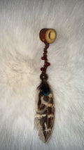 Dangle bead-feather