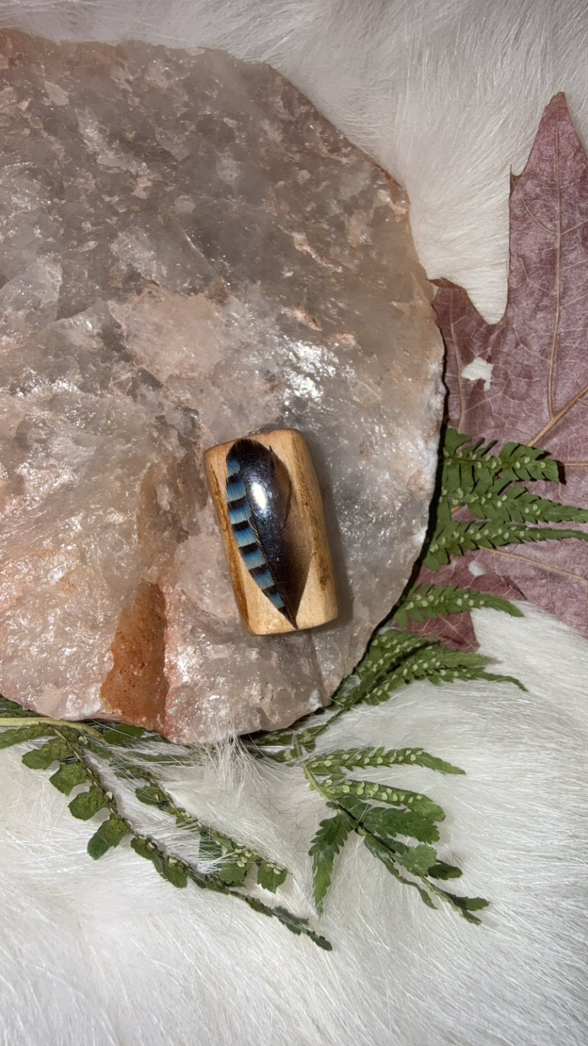 Bead blue feather